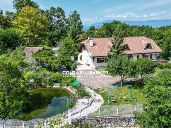 Propriété avec vue sur le lac Léman et jardin arboré à Collonges-sous-Salève.