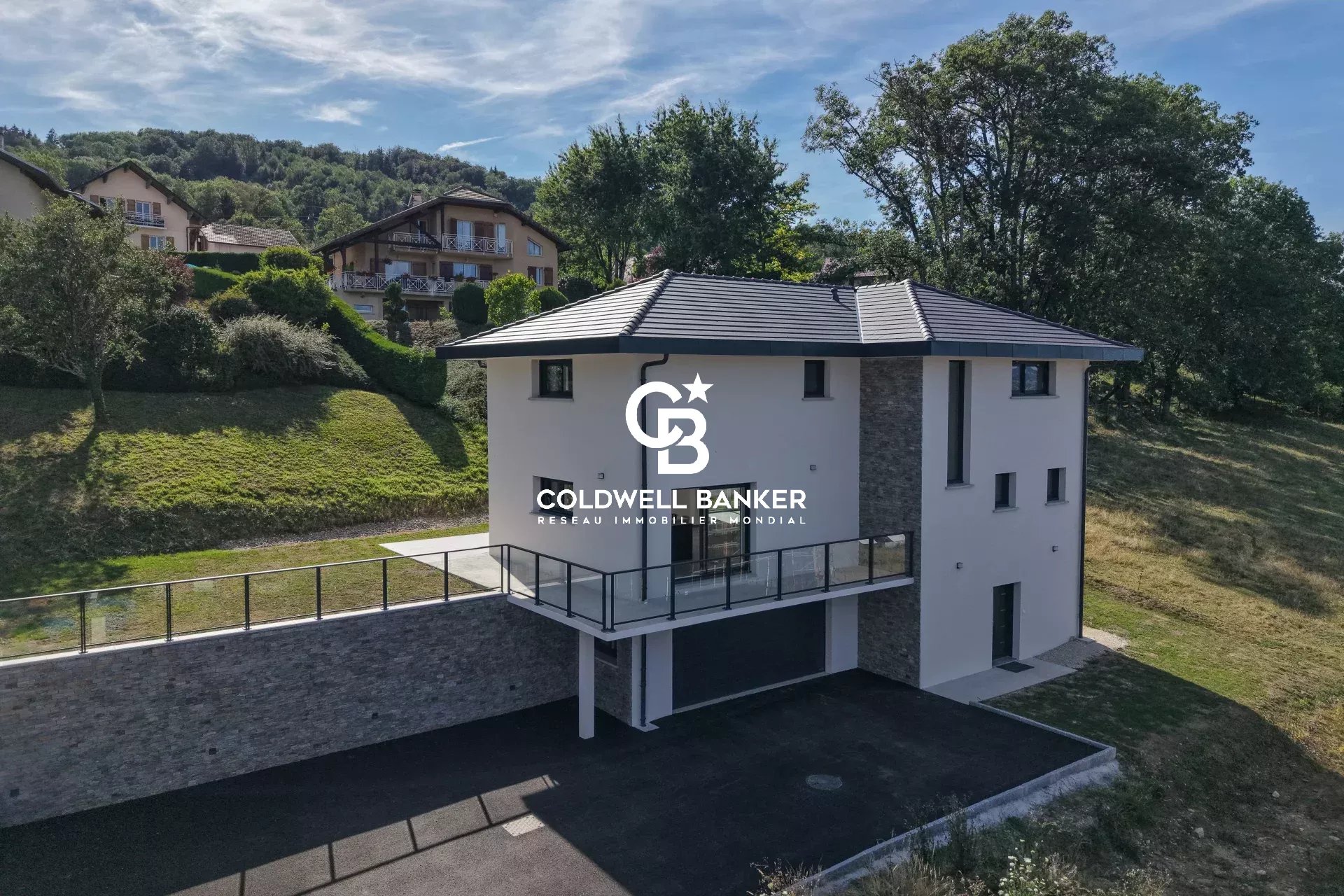 New house in Etaux Modern house for sale with terrace and garden in Etaux, view of the Môle and the Aravis.