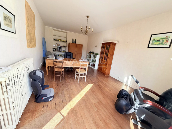 Interior of a farmhouse with wooden furniture and natural light