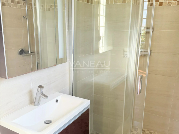 Modern bathroom with shower and sink in a farmhouse in La Chapelle-Gauthier.