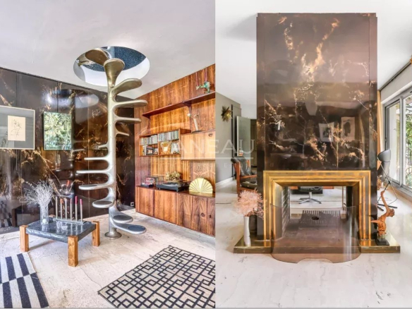 Intérieur d'une maison d'architecte moderne avec un escalier sculptural et un salon élégant.