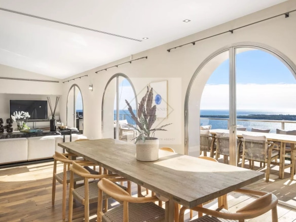 Interior of a spacious villa in Cannes with views of the Mediterranean Sea.