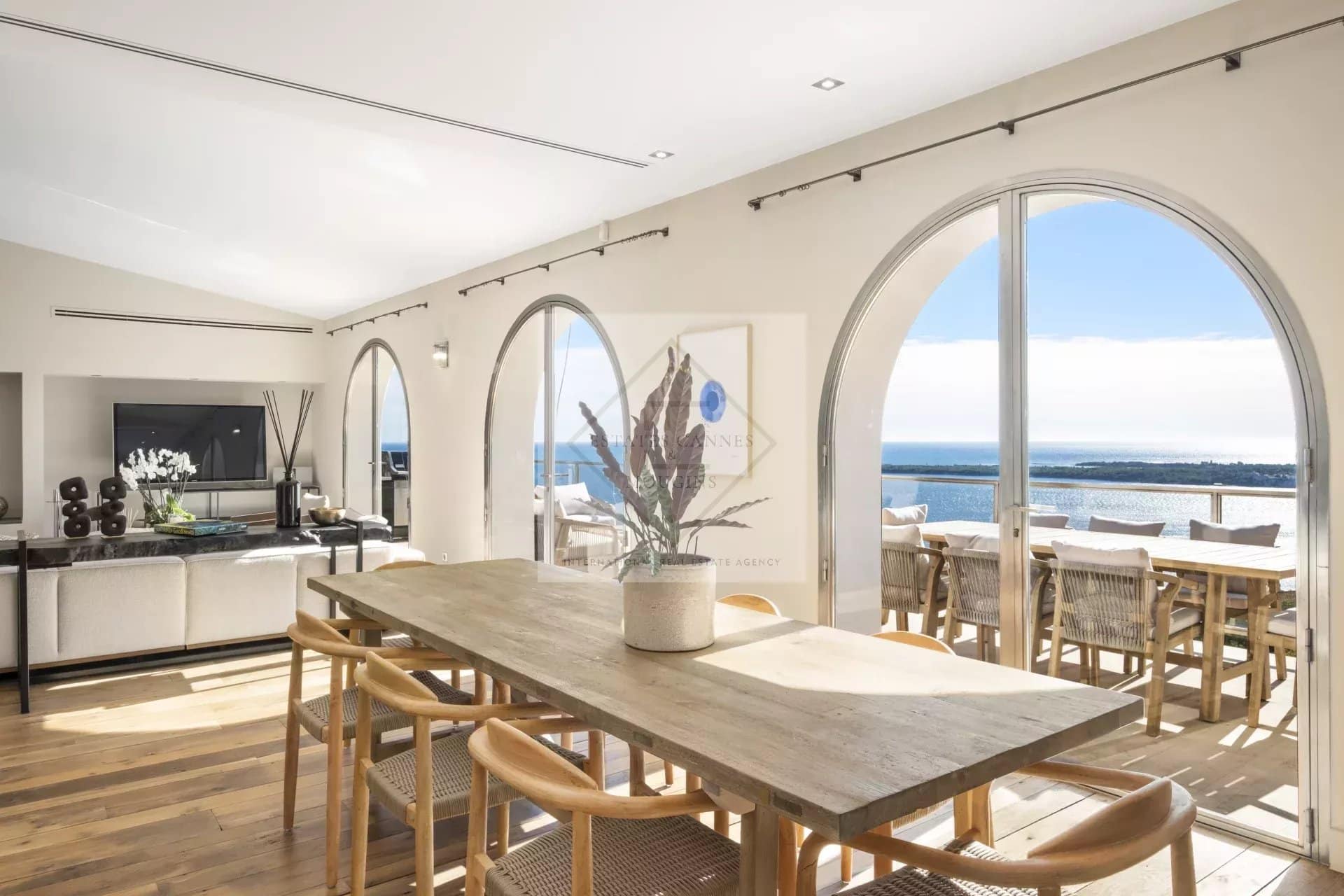 Interior of a spacious villa in Cannes with views of the Mediterranean Sea.