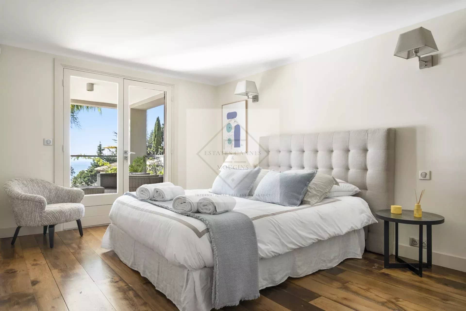 Room in a spacious villa in Cannes with a view of the Mediterranean Sea.