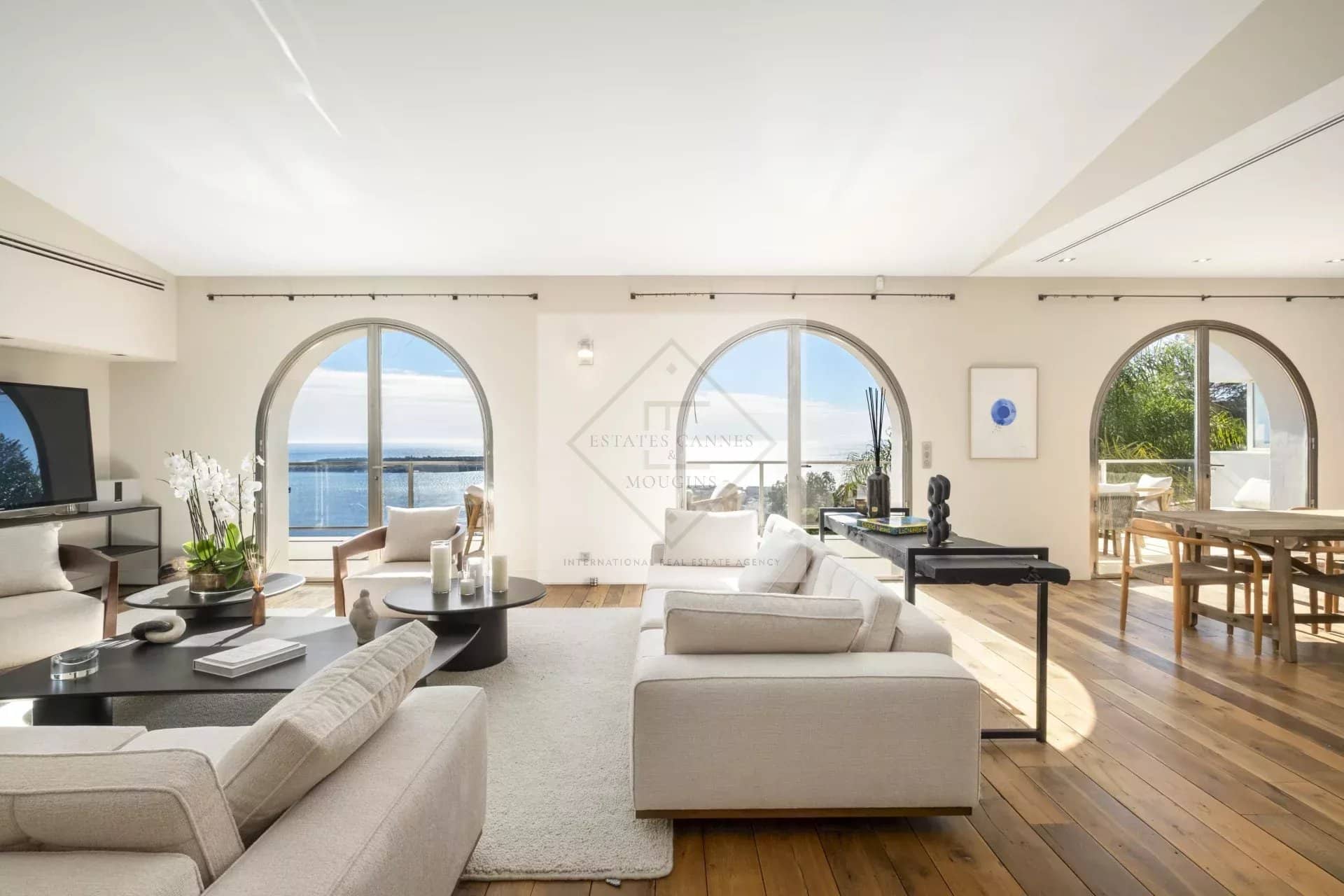 Spacious interior of a villa in Cannes with views of the Mediterranean Sea.
