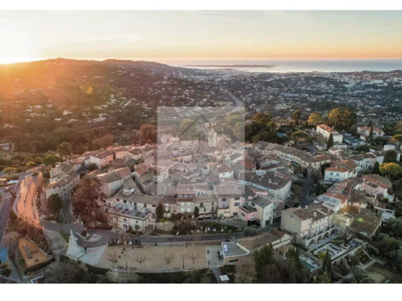 Aerial view of the medieval village of Mougins at sunset.