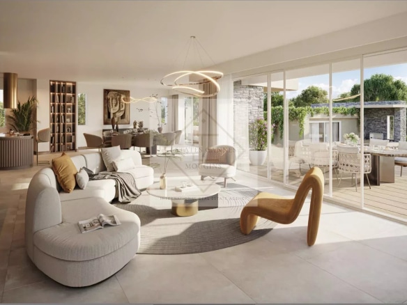 Interior of a contemporary villa with a bright living room and access to an outdoor terrace.