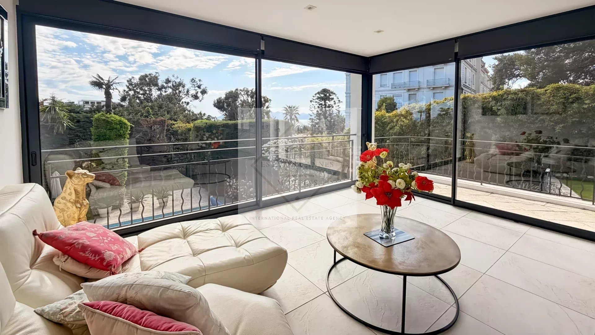 Modern interior of a luxury villa in Cannes with garden views.