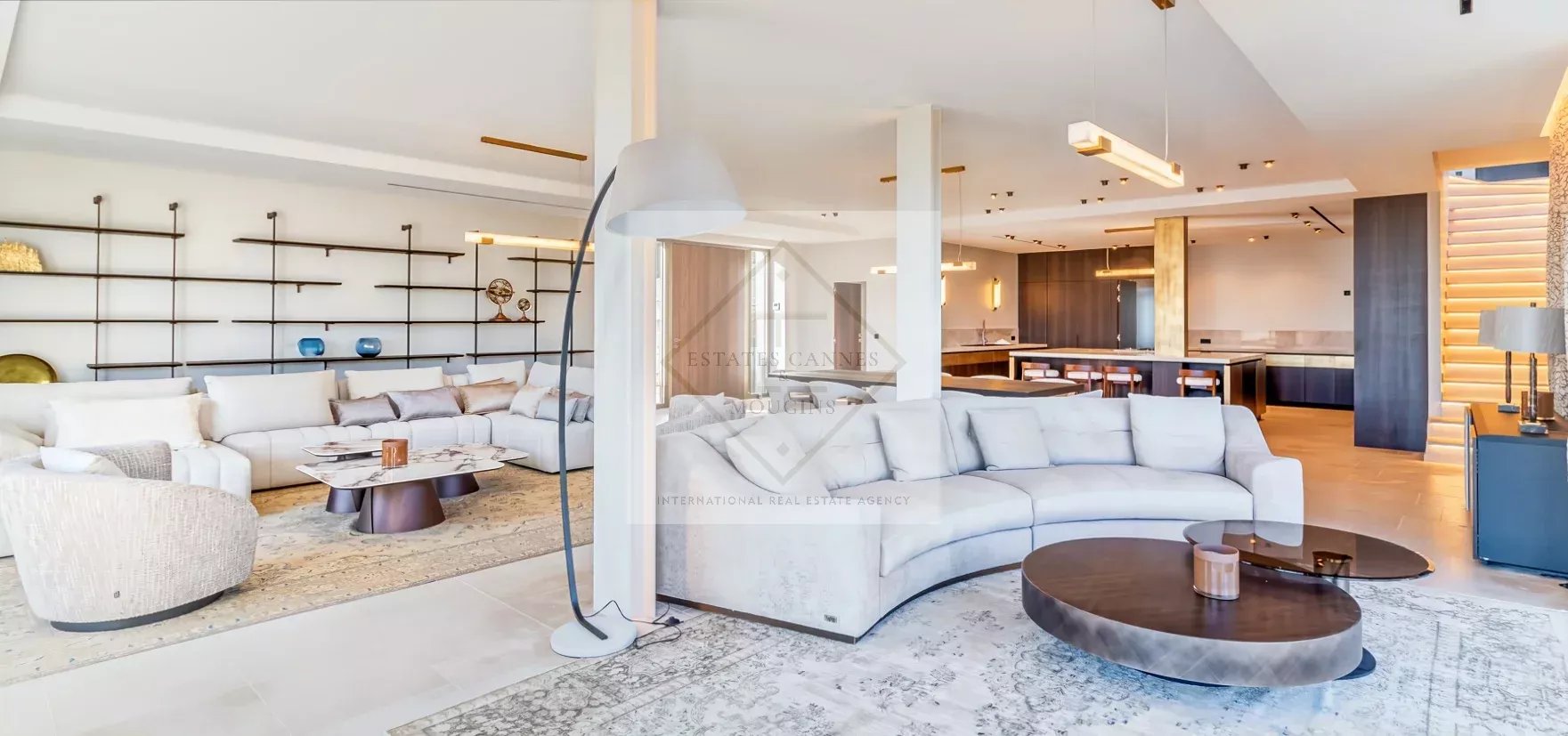 Interior of a villa in Super Cannes Interior of a contemporary villa in Super Cannes with a spacious living room and open kitchen.