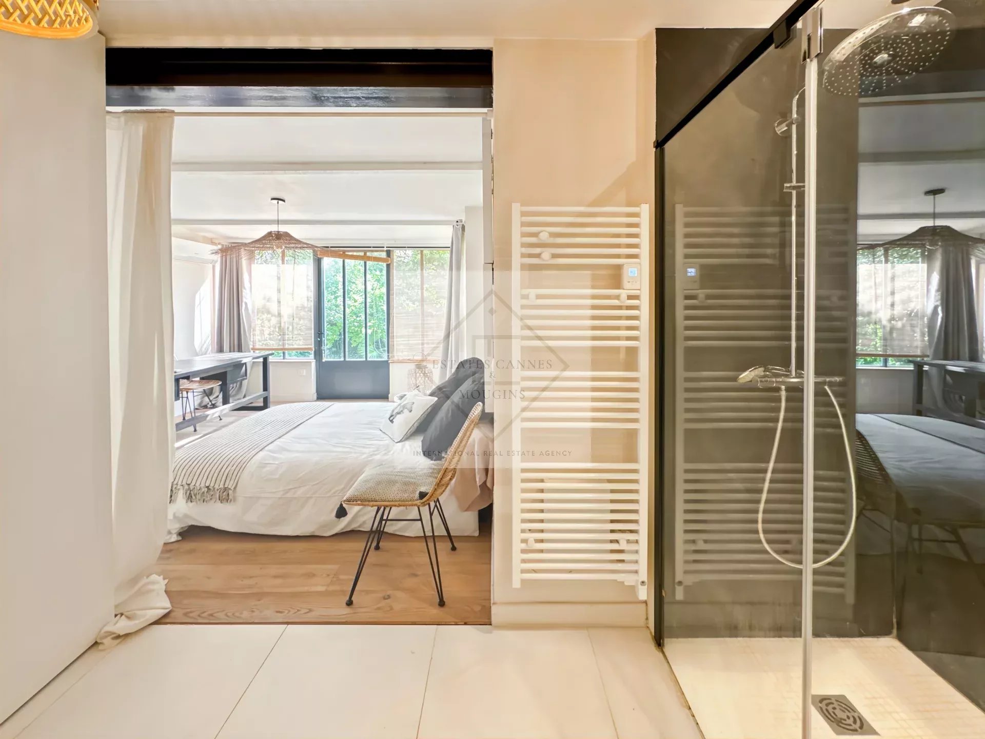 Bathroom and bedroom Modern bathroom with shower and adjoining bedroom in an elegant home.