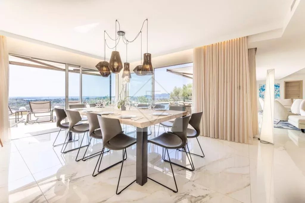 Dining room of the modern villa in Mougins Modern dining room with sea view, villa in Mougins