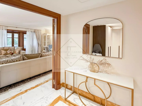 Interior of an elegant apartment with a spacious living room and refined decor in Cannes.