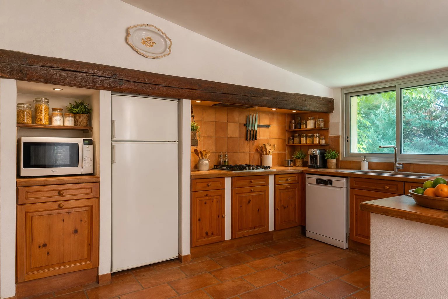 Kitchen of the property in Fourques Kitchen in a property in Fourques with wooden furniture and modern equipment.