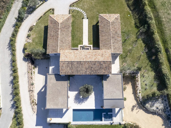 Aerial view of an architect-designed villa with swimming pool and garden, Bouc-Bel-Air, near Aix-en-Provence.