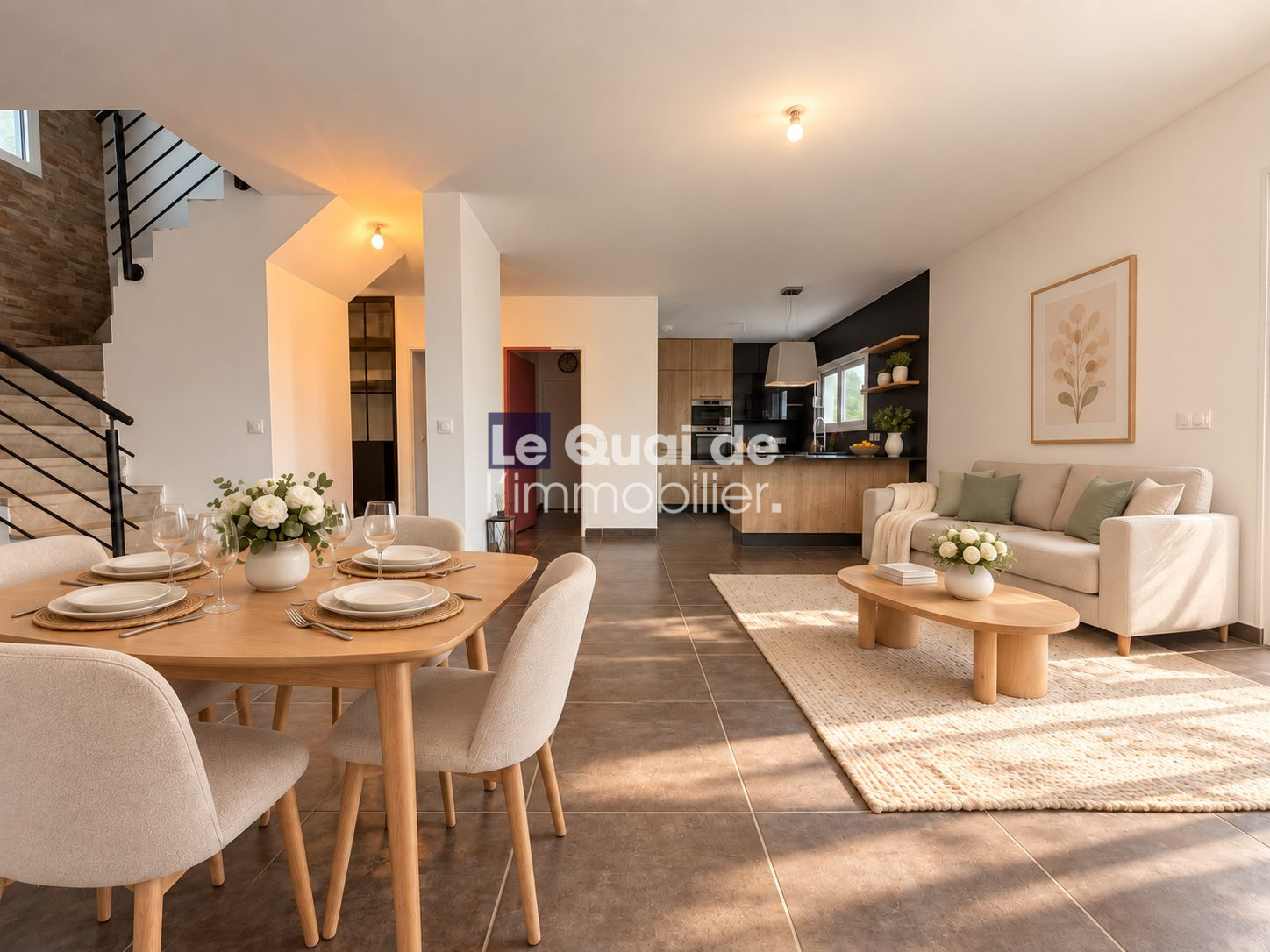 Intérieur d’une maison à Cruseilles Intérieur d'une maison moderne avec salon, salle à manger et cuisine ouverte à Cruseilles.