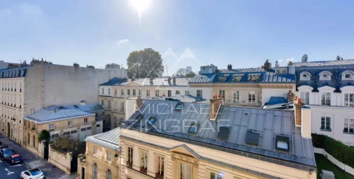 View from an apartment in the 7th arrondissement of Paris Unobstructed view over Parisian rooftops from a 4th floor apartment in Paris 7th arrondissement.