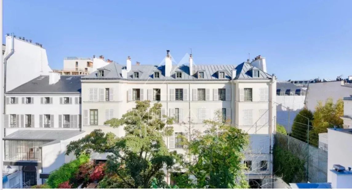 Old building in the 7th arrondissement of Paris View of an old building in Paris, rue Las Cases, with gardens below.