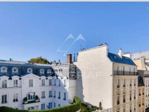 Unobstructed view of Parisian buildings and a bell tower, Paris 7th arrondissement.