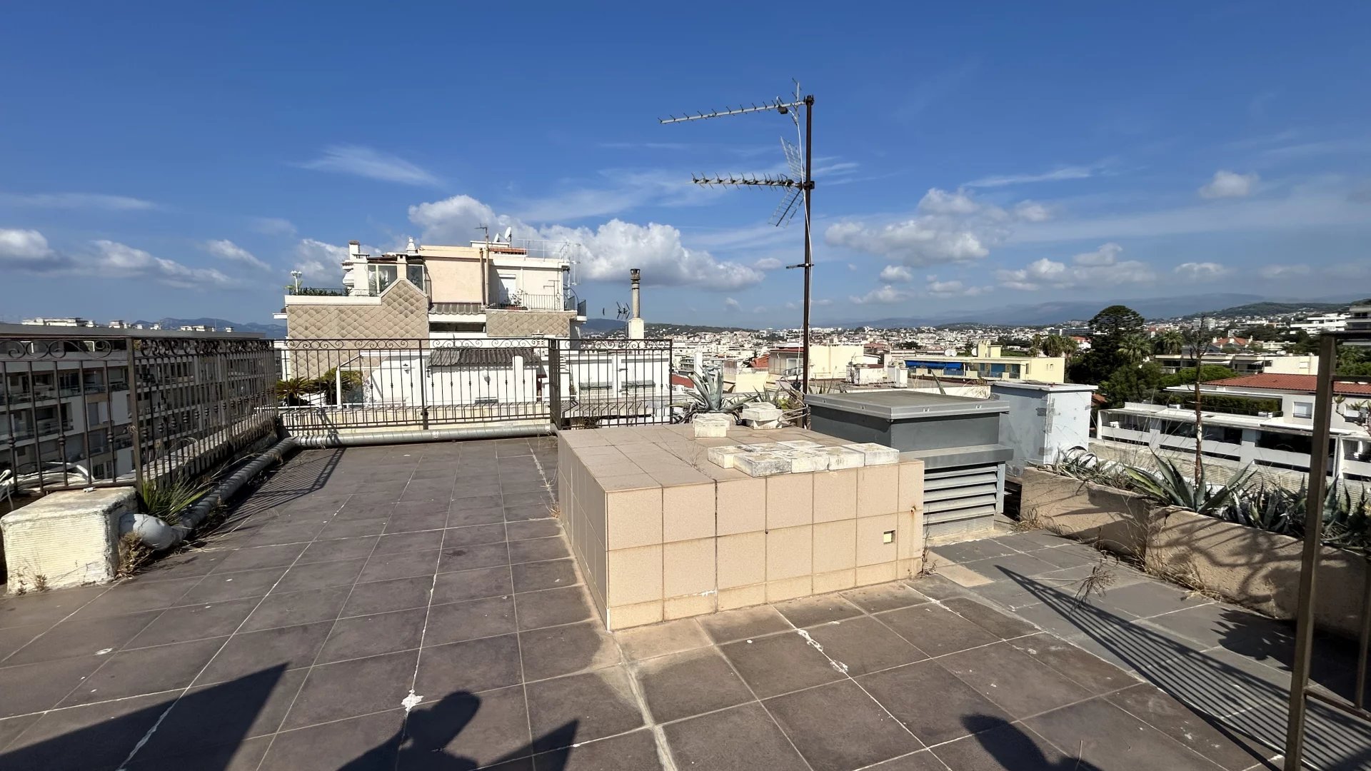 Terrace in Cannes with sea view Terrace with sea view in Cannes, Basse Californie area, clear skies.