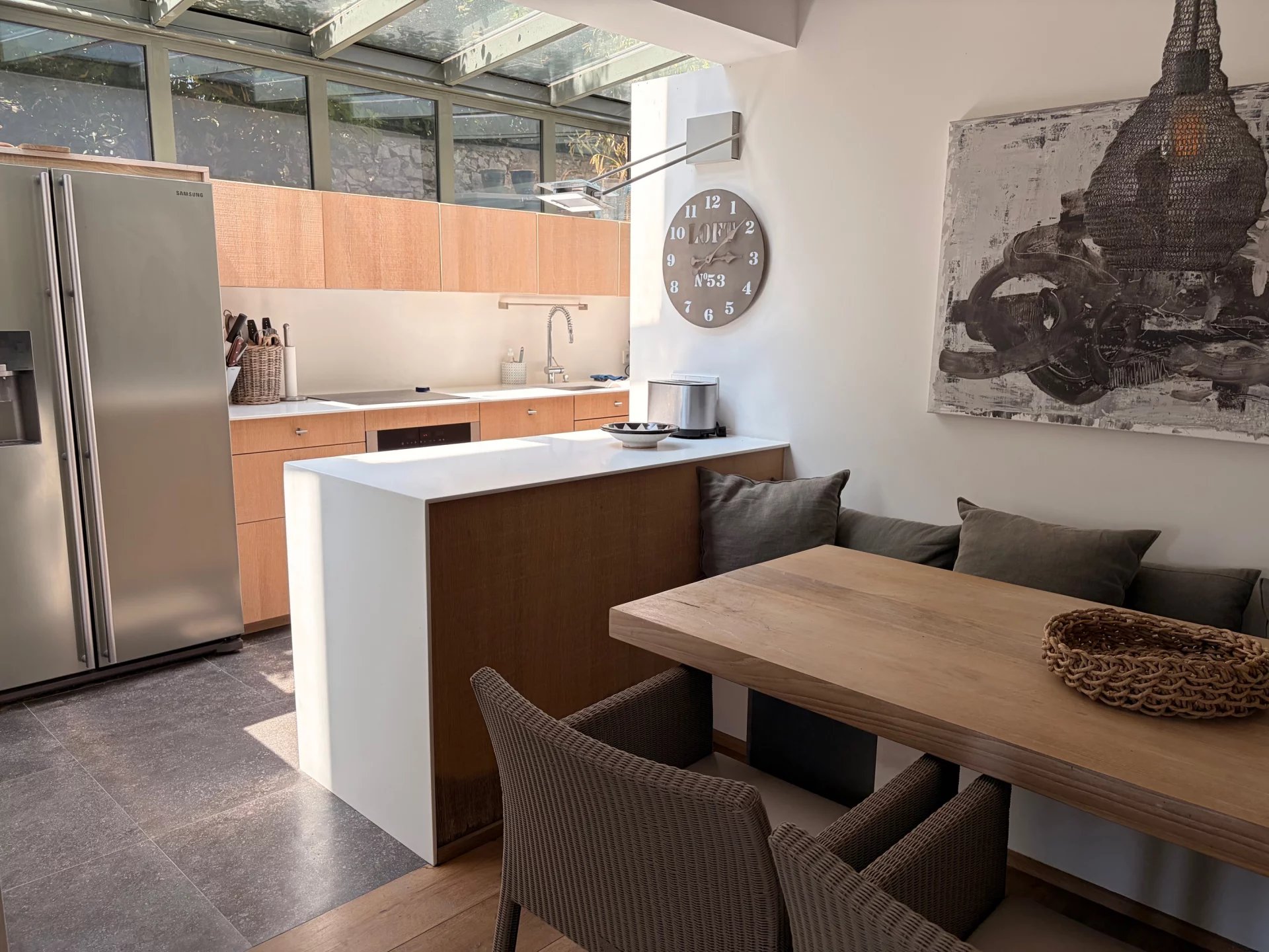Modern apartment in Antibes Interior of a modern apartment with open-plan kitchen and dining area