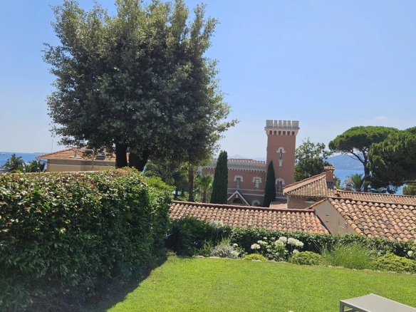 Garden and sea view from a raised ground floor apartment in Antibes.
