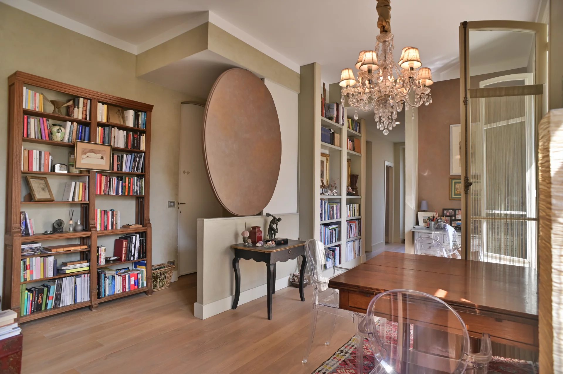 Belle Époque apartment in Cannes Interior of a Belle Époque apartment in Cannes, with library and chandelier.