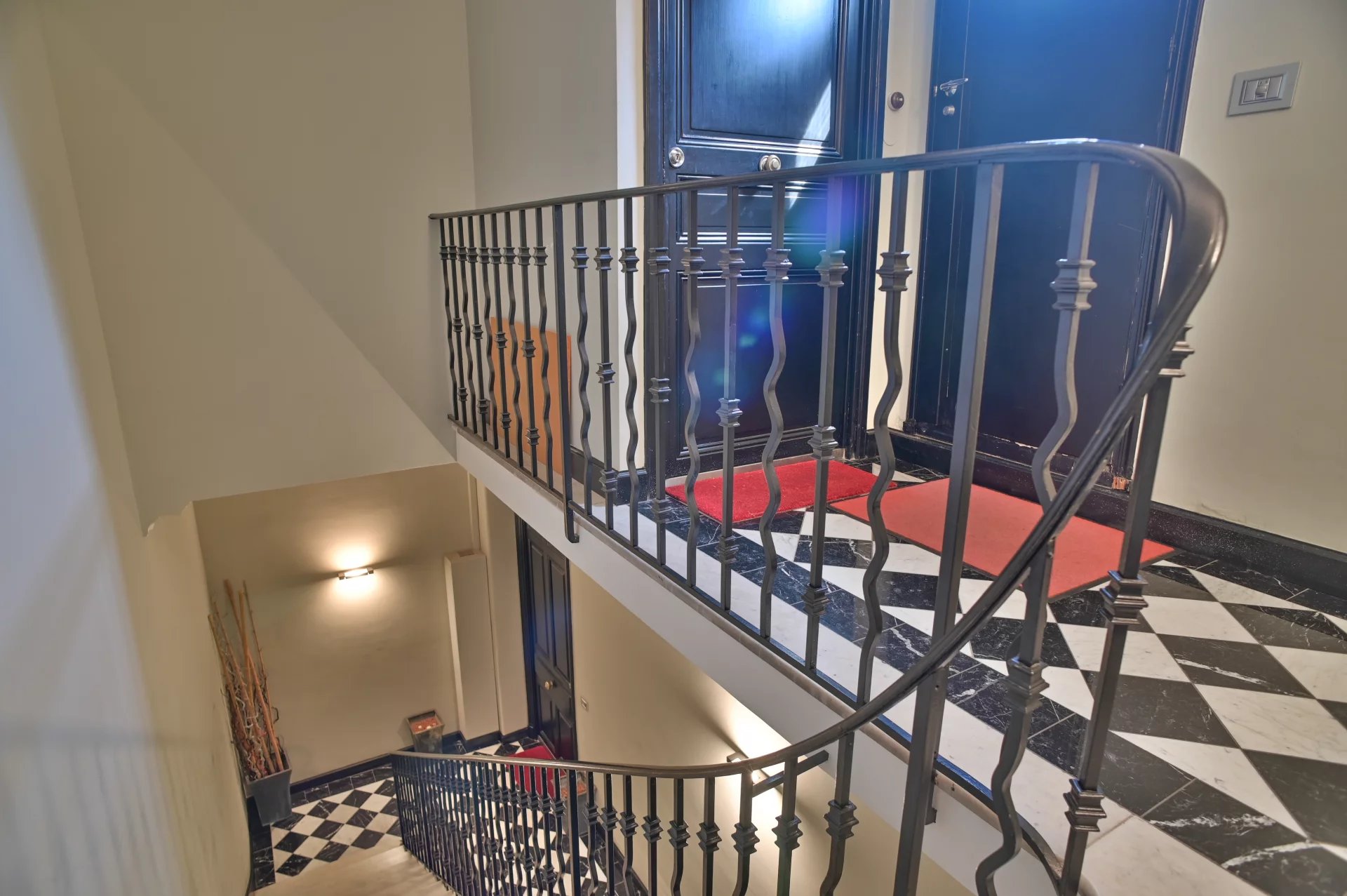Staircase of a Belle Époque building in Cannes Spiral staircase with wrought iron railing in a Belle Époque building in Cannes.