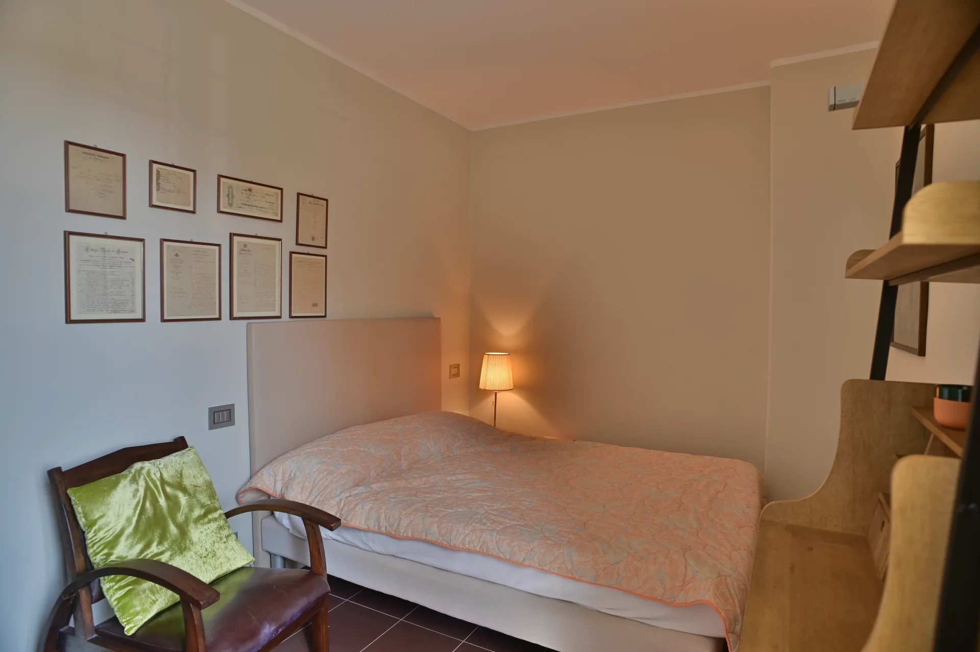Bedroom in a Belle Époque apartment in Cannes Room in a renovated apartment in a Belle Époque building in Cannes, with bed and armchair.