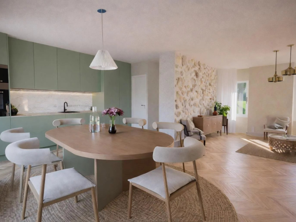 Intérieur d'un appartement rénové avec cuisine moderne et salle à manger, mobilier contemporain.