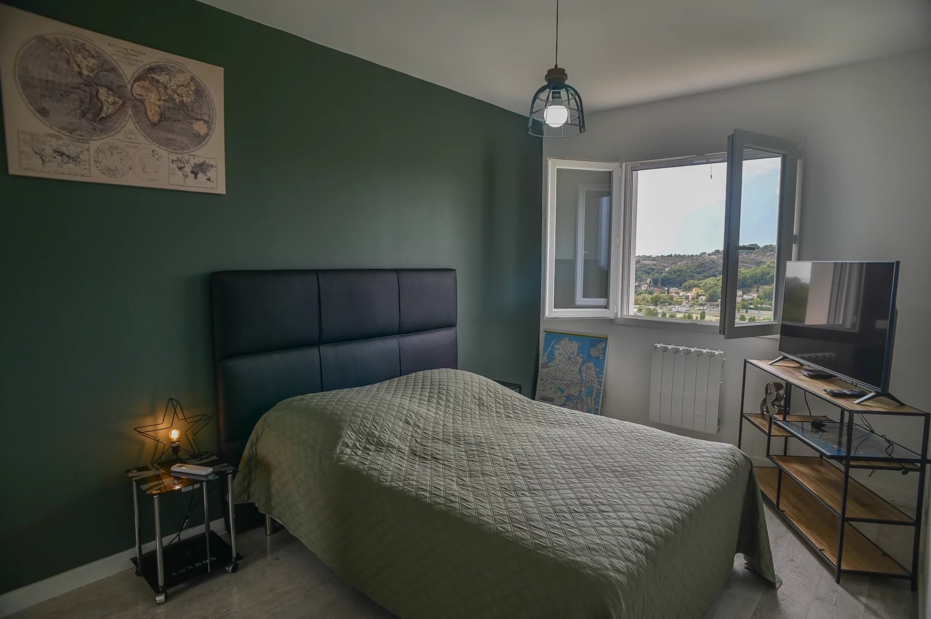 Contemporary villa bedroom Room in a contemporary villa with a double bed and an outside view.