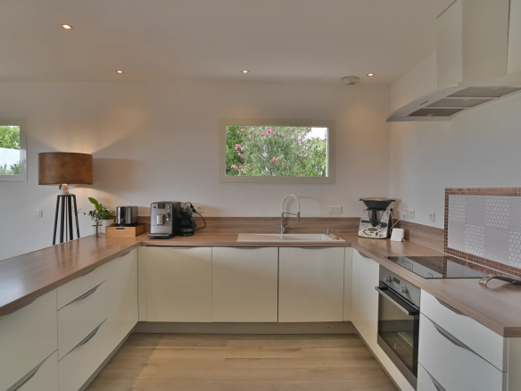 Modern and bright kitchen of a recent villa in Villeneuve-Loubet