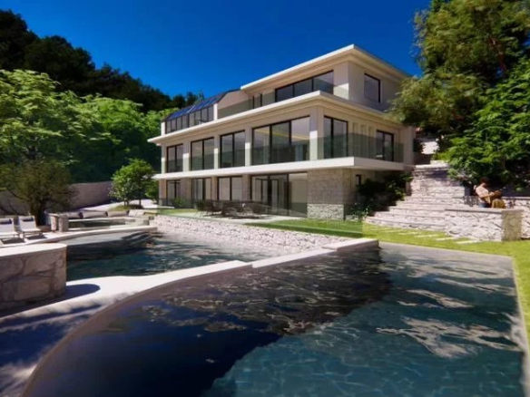 Villa moderne avec piscine et vue sur la mer à Èze, entourée de verdure.