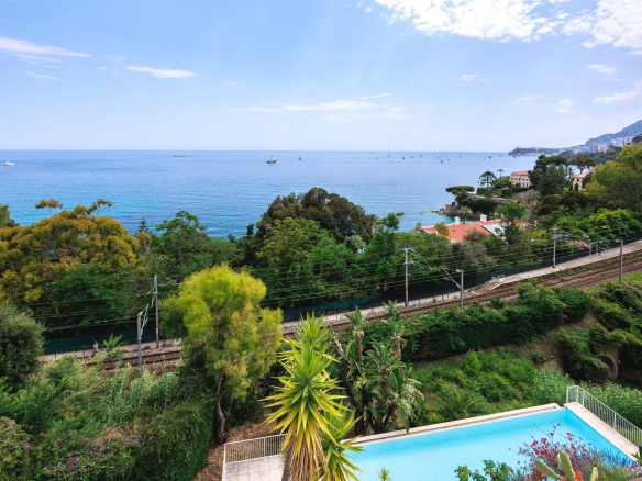Panoramic sea view from an apartment in Roquebrune-Cap-Martin with swimming pool.