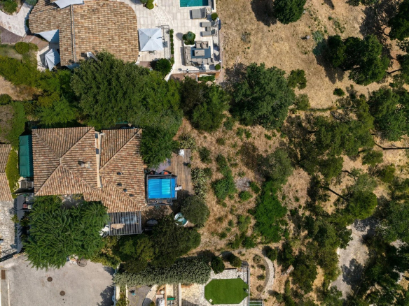 Aerial view of a house with swimming pool and garden in Les Adrets-de-l'Estérel.