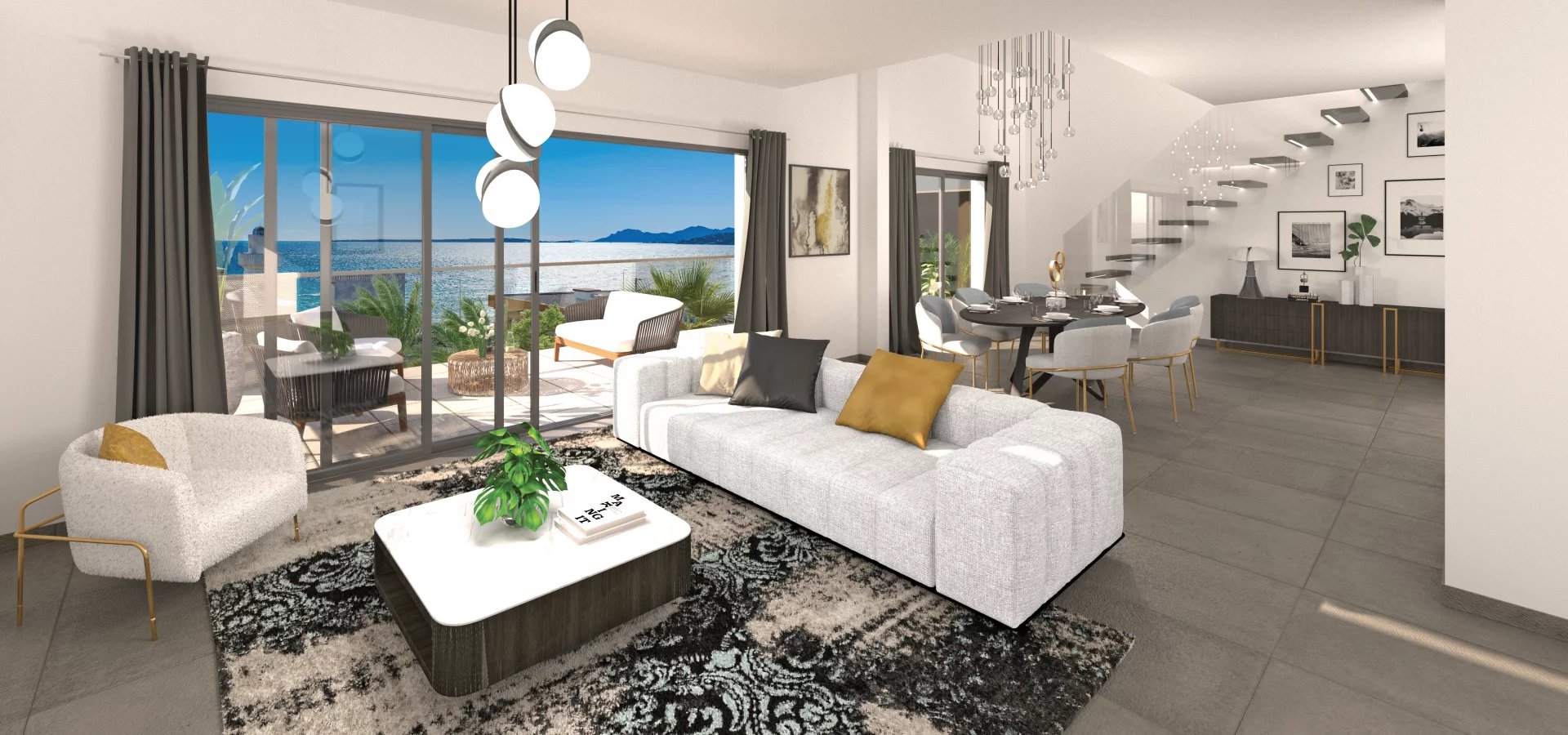 Penthouse moderne à Juan-les-Pins Intérieur d'un penthouse moderne à Juan-les-Pins avec vue sur la mer, salon et salle à manger.