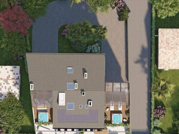 Vue aérienne d'une résidence neuve avec toit terrasse et jacuzzi à Juan-les-Pins.