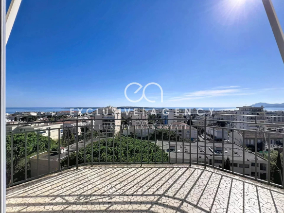 Panoramic sea view from a top-floor balcony in Cannes.
