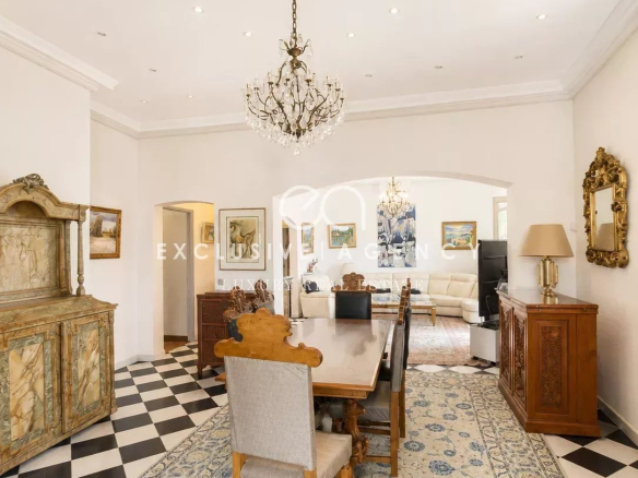 Interior of a villa in Cannes with elegant dining room and refined decoration.