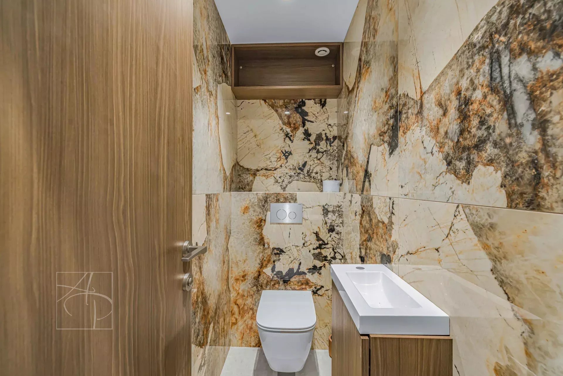 Renovated bathroom Modern bathroom with marble tiles and separate toilet.