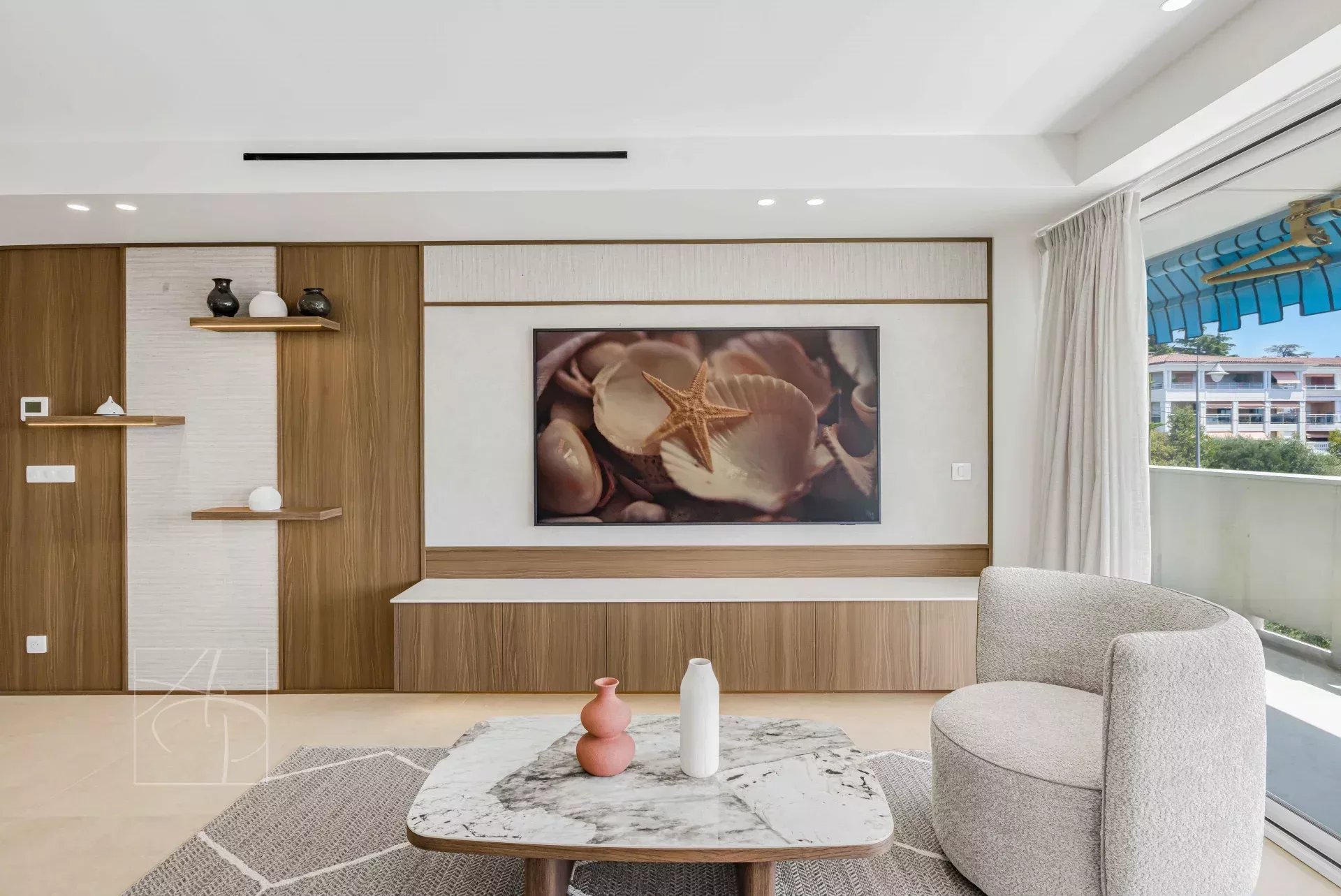 Renovated apartment in Cannes Interior of a renovated apartment with a bright and modern living room in Cannes.