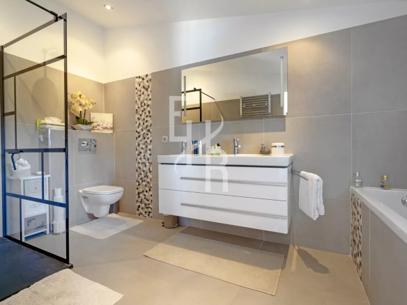 Modern bathroom with shower, bathtub and double vanity unit