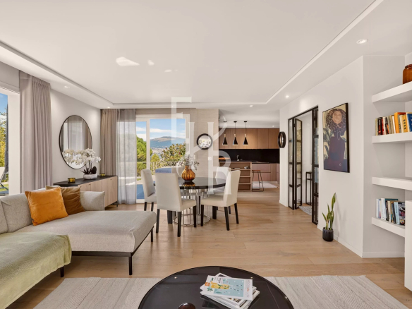 Interior of a modern villa with a bright living room and views of nature.