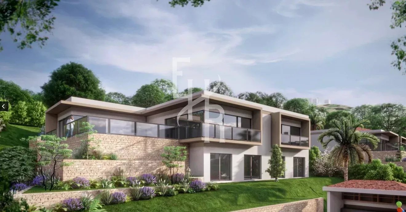 Villa moderne projetée à Mougins Vue d'une villa moderne projetée sur un terrain à Mougins, avec jardin et végétation environnante.