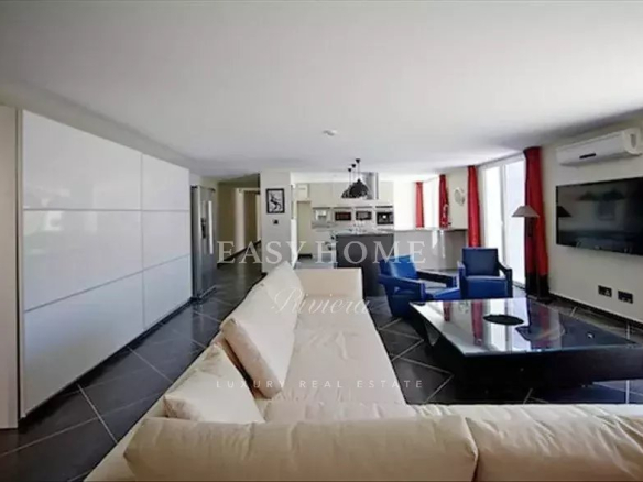 Modern interior of a luxury villa in Grasse with bright living room and elegant decor.