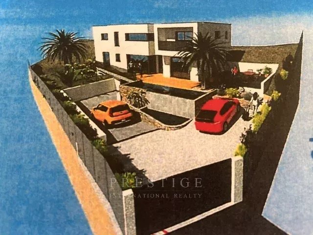 Villa contemporaine à Châteauneuf-Grasse Vue d'une villa contemporaine sur un terrain en restanques à Châteauneuf-Grasse, avec garage et jardin.