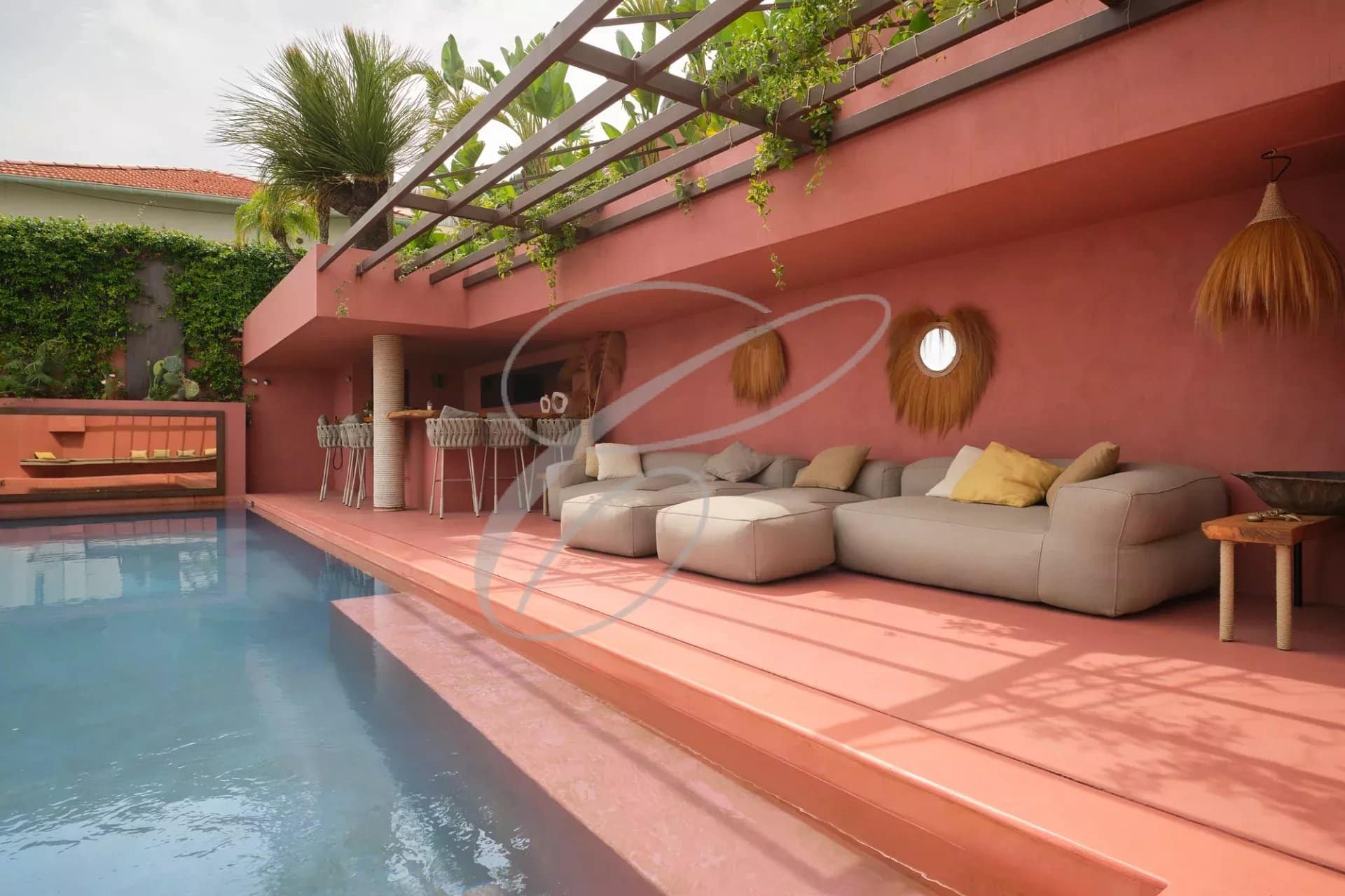 Terrace of a contemporary villa with swimming pool and lounge, Roquebrune-Cap-Martin.