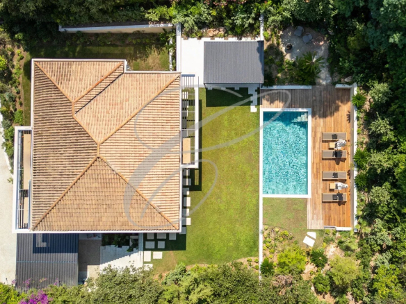 Aerial view of a luxury villa with swimming pool and garden in Roquebrune-Cap-Martin.