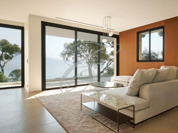 Interior of a luxury villa in Roquebrune-Cap-Martin with modern living room and sea view.