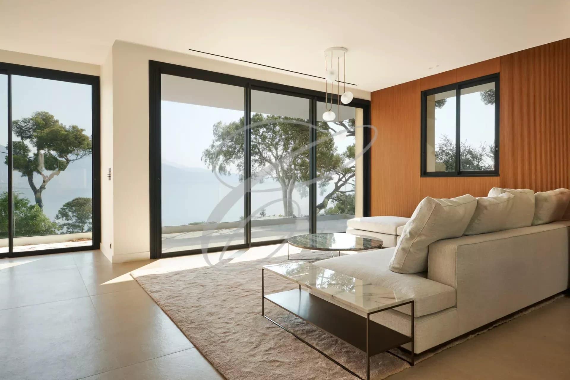 Interior of a villa in Roquebrune-Cap-Martin Interior of a luxury villa in Roquebrune-Cap-Martin with modern living room and sea view.