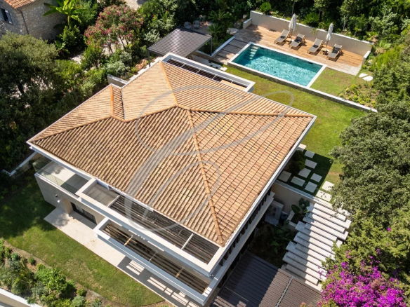 Aerial view of a luxury villa with swimming pool and garden in Roquebrune-Cap-Martin.